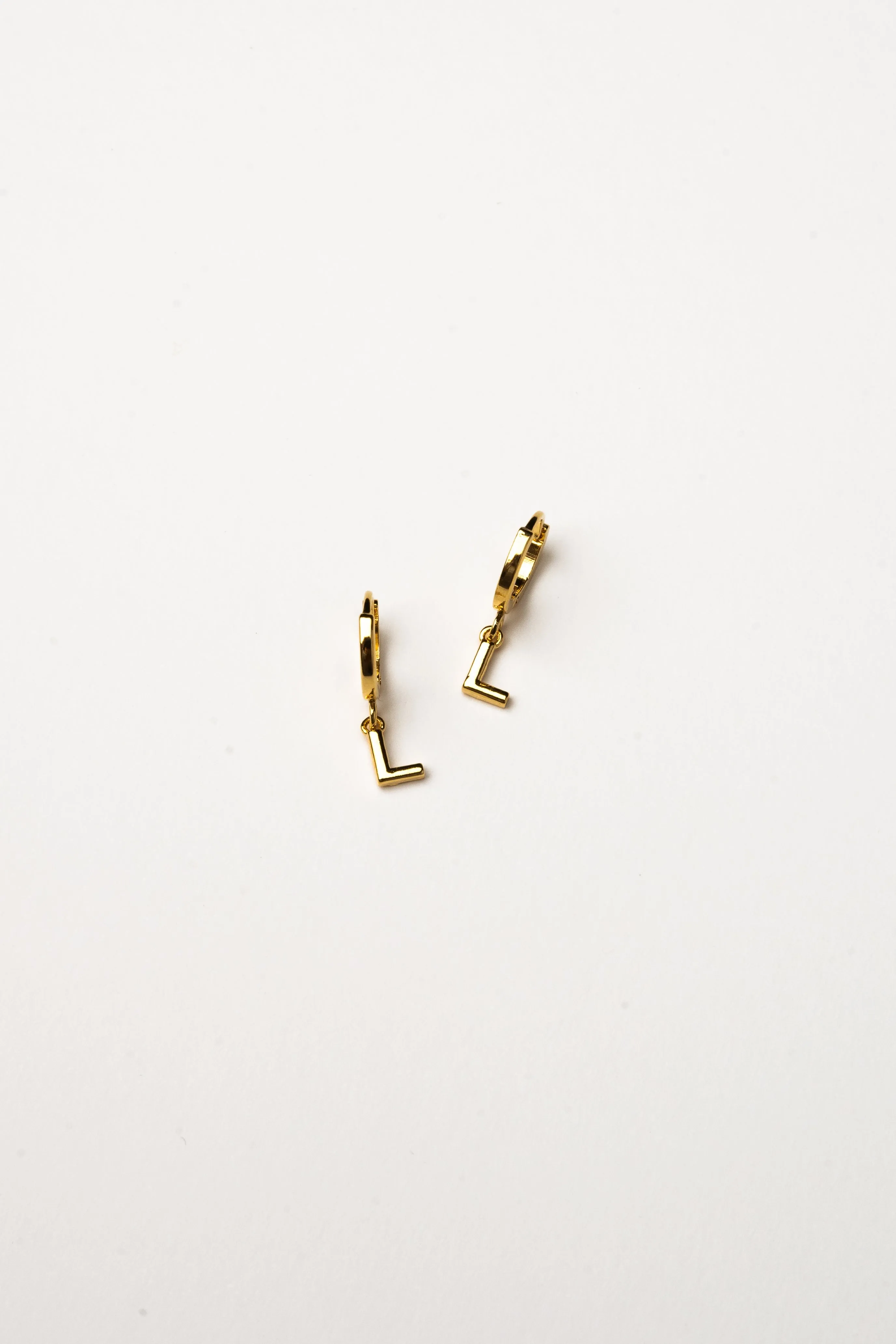 Cove Initial Letter Huggie Earrings