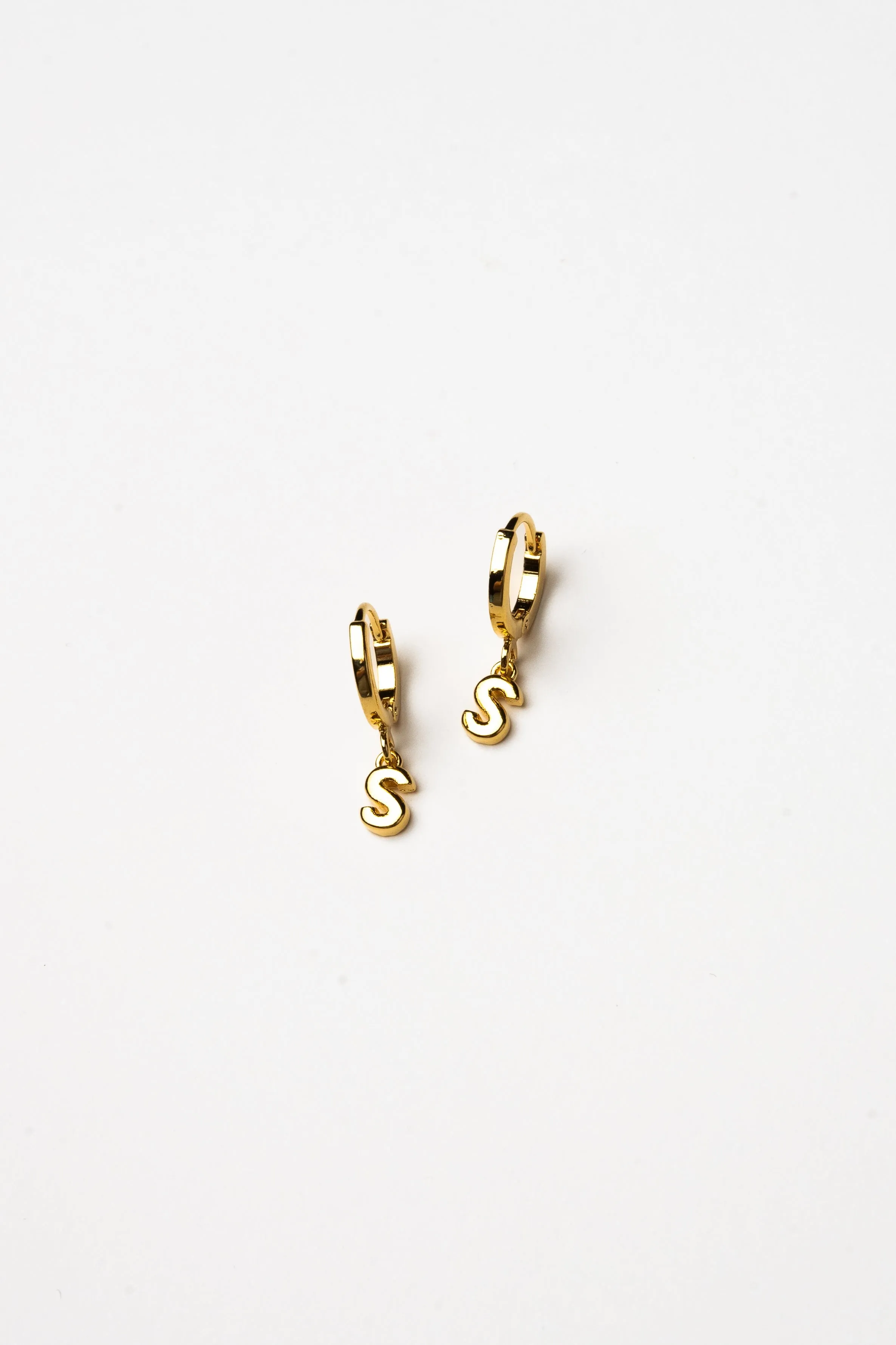 Cove Initial Letter Huggie Earrings