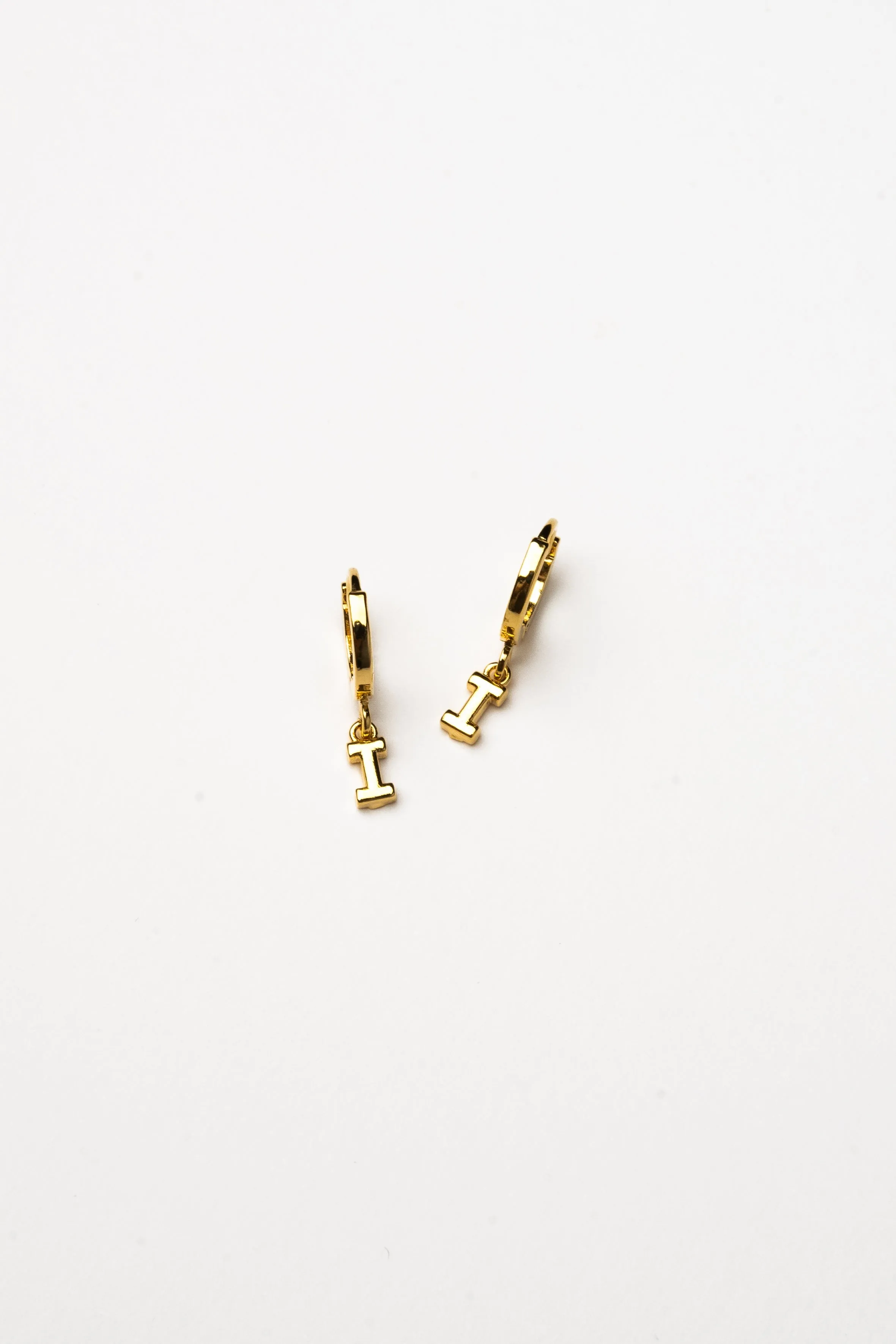 Cove Initial Letter Huggie Earrings